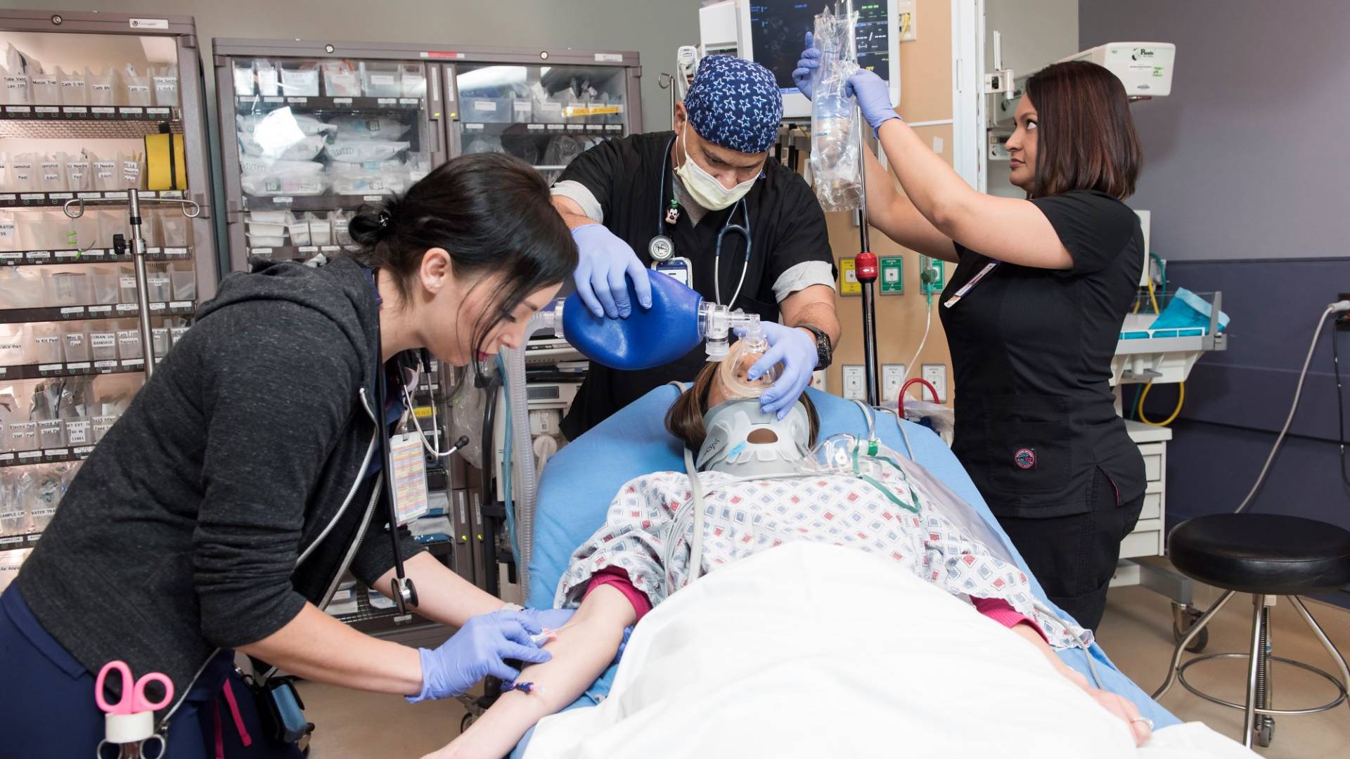 Group of students in an emergency room simulation.